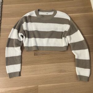 Great condition has almost invisible pilling on the back of the left sleeve.